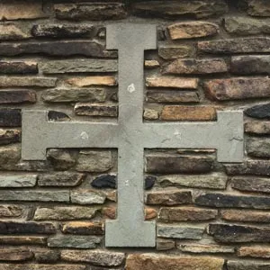 Masonry Cross embedded into brick wall